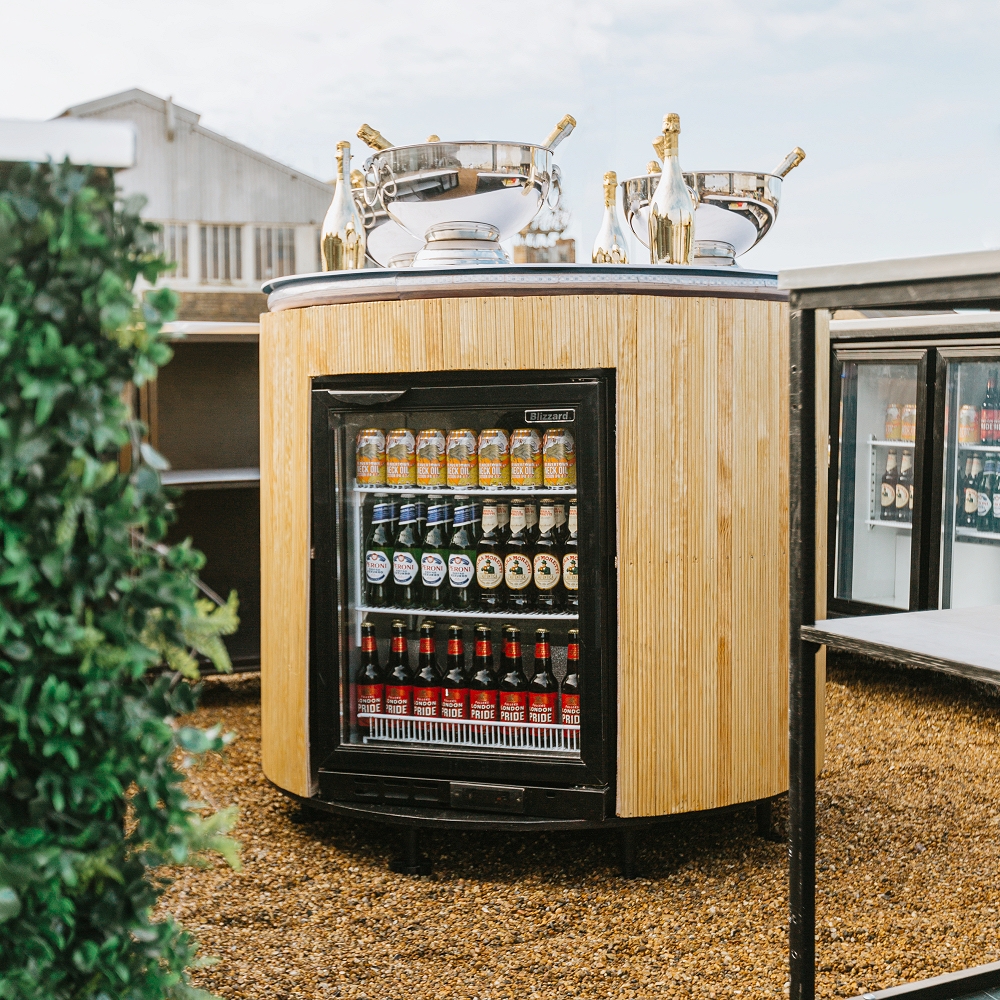 Circular Reeded Back Bar With Two Single Fridges
