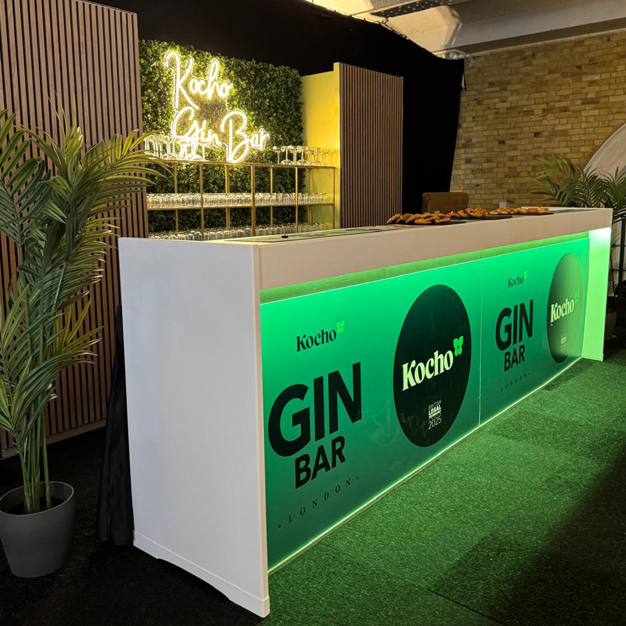 Our brand new white modular bar with living wall back bar and a mix of our new walnut slatted panels.